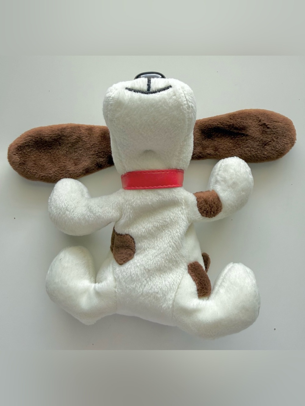 White and Brown Plush Dog with Red Collar